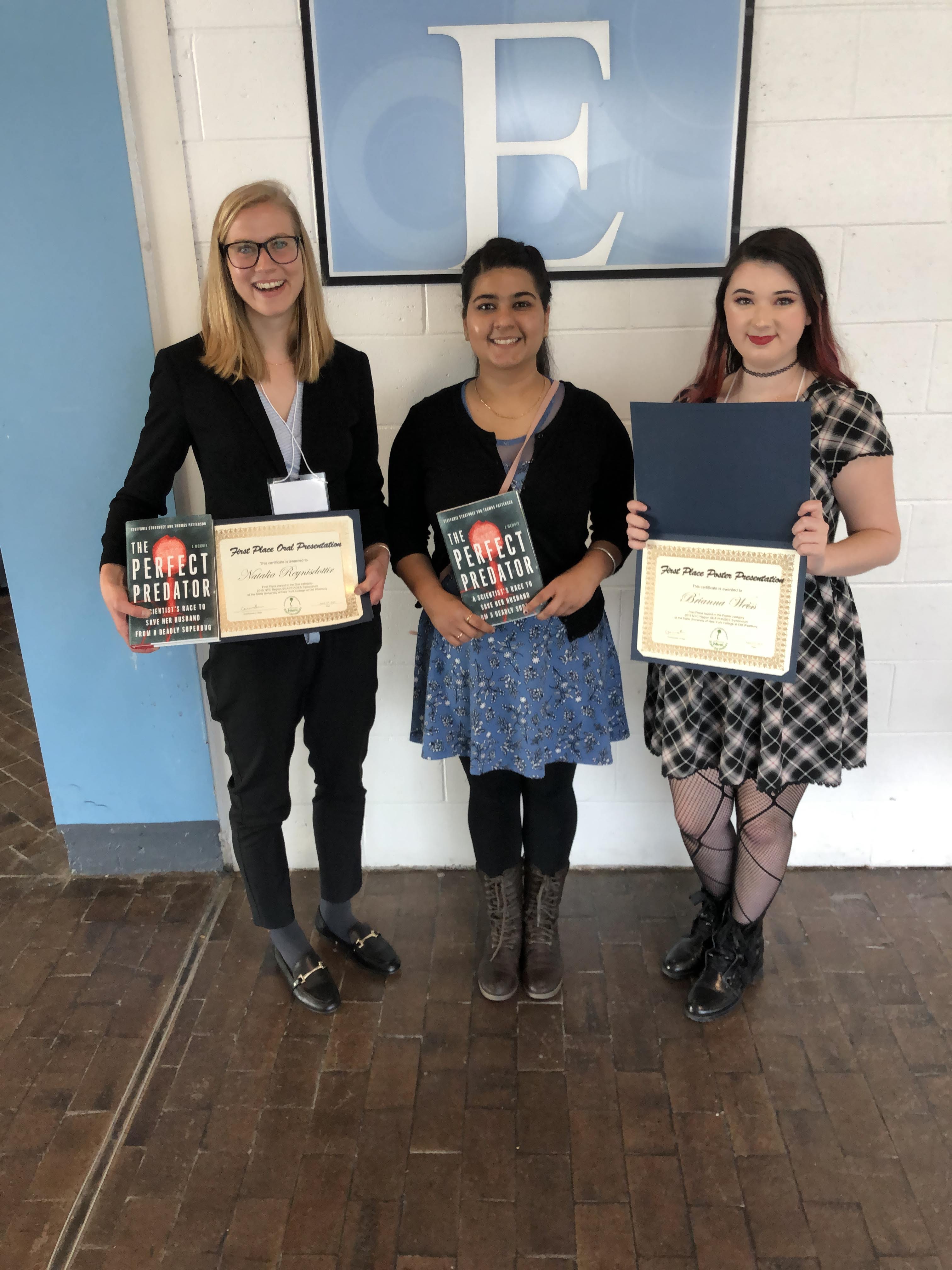 NYIT Life Science students, Natalia Reynisdottir, Lovejit Kaur and Brianna Weiss with their awards