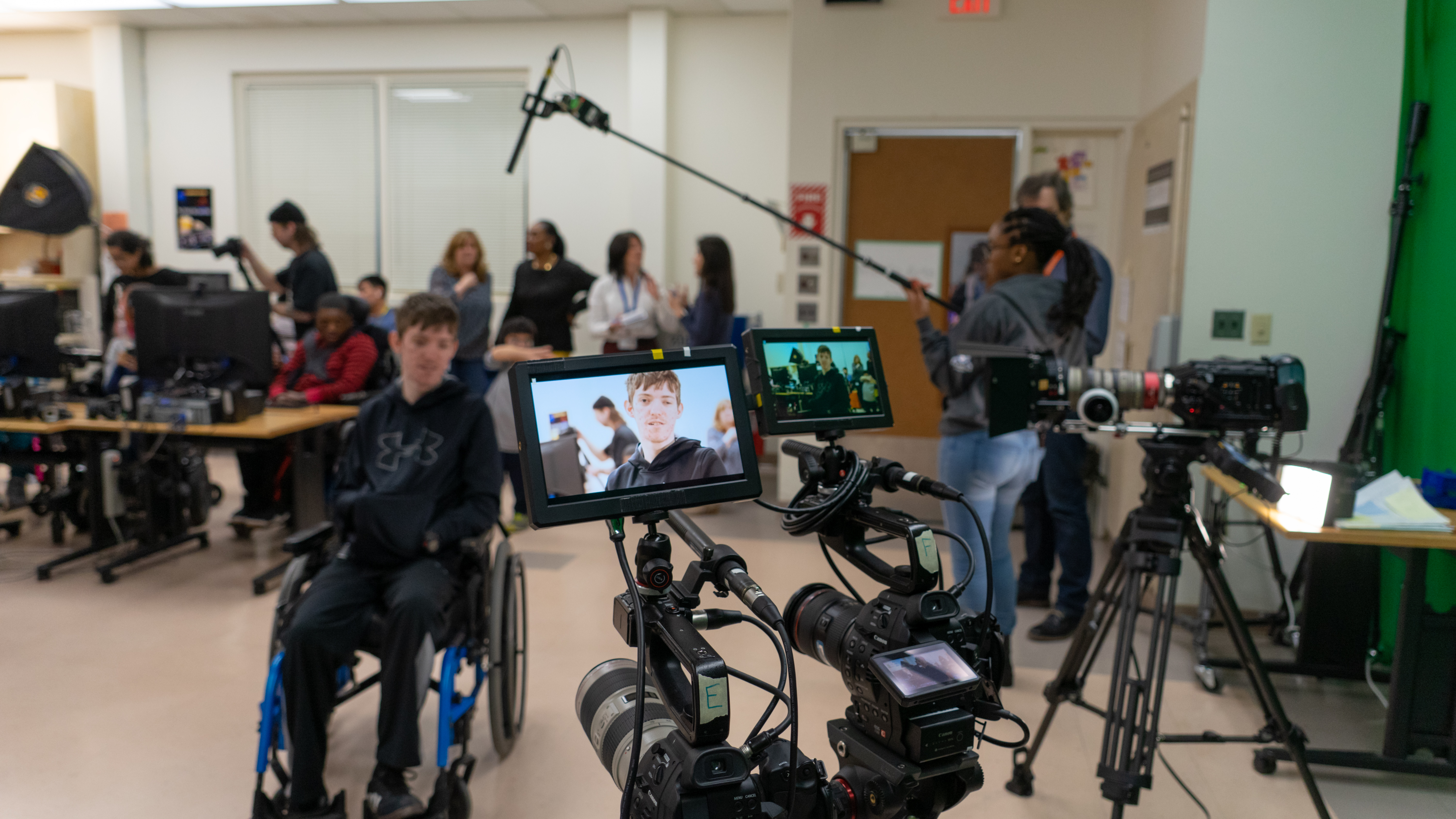 This photo demonstrates a multi-camera set up before interviewing the Henry Viscardi students to get their reactions of the flight announcement and to break the ice about life in high school. 
