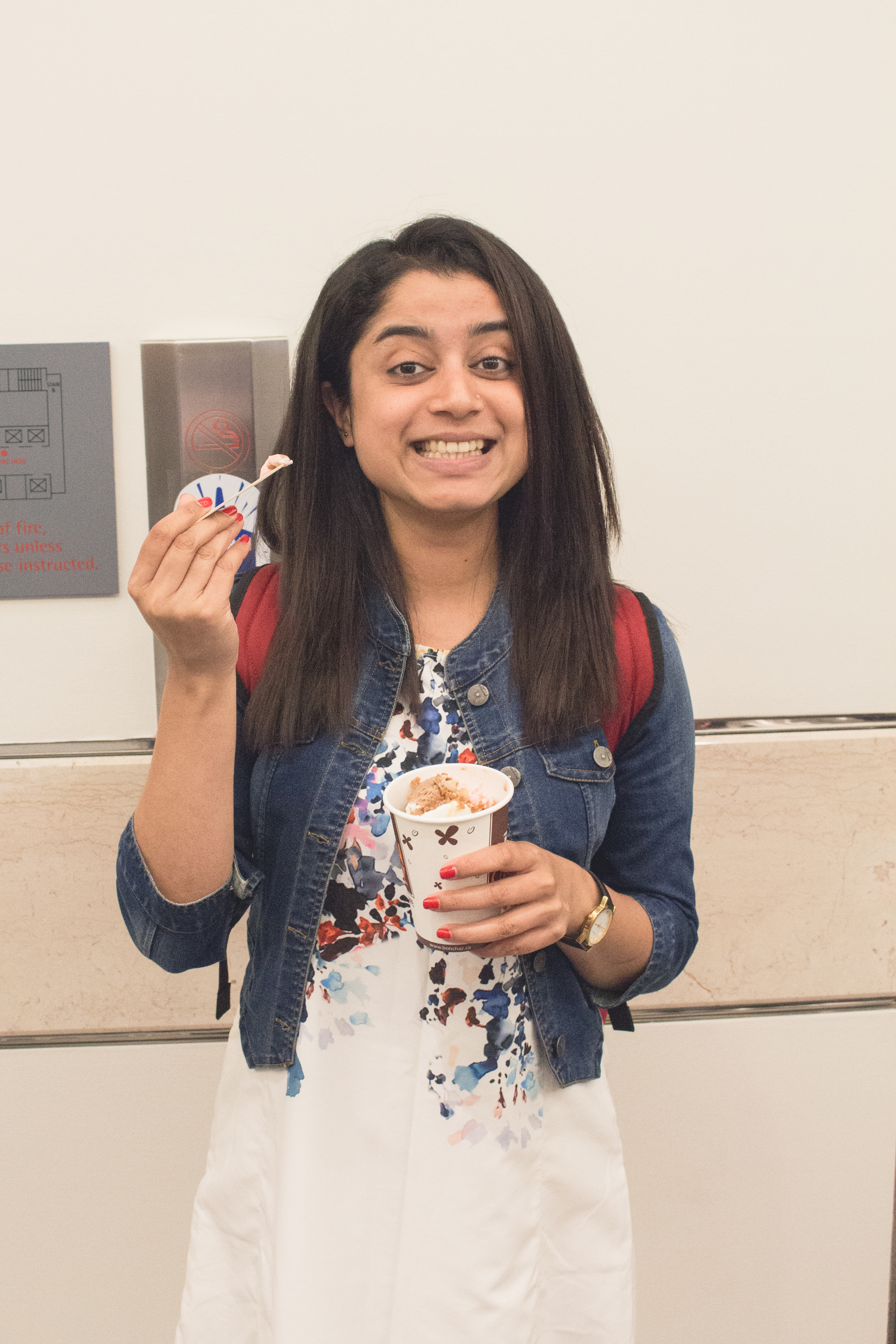 A happy student enjoying their ice cream